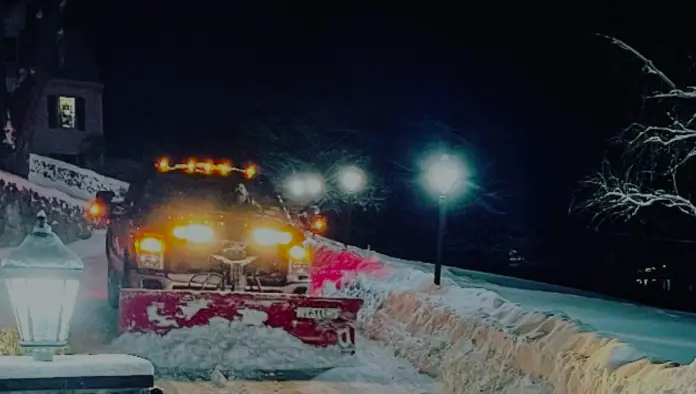 Snow plowing service clearing a Dutchess County driveway